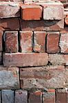 a close up of an old pile of bricks