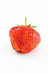 Single tasty ripe red strawberry isolated on the white background