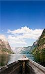 An old boat on a majestic norwegian fjord