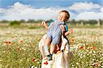 mother and son on natural background