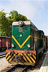 colorful old diesel train in railway yard