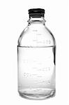 Medical bottle for infusions with physiologic saline, isolated, on white background