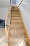 A staircase area in newly restored rebuilt house