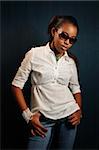 Portrait of young african female fashion model with sunglasses