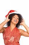 Friendly excited dark skinned mid-aged woman in holiday hat