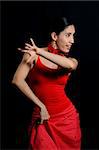Portrait of passionate flamenco dancer isolated on black