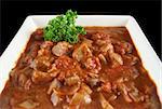 Delicious beef and red wine casserole ready to serve.