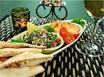 Tabbouleh with hommus and lemon chick peas with fresh pita bread.