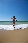 woman bikini dressed at el palmar beach in cadiz spain