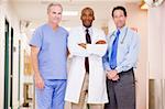 Doctors Standing In A Hospital Corridor