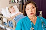 Doctor Looking Serious In Patients Room