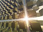 A building of old mossy cubes in an array in space with a beam of light.