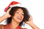 Headshot of happy gesturing attractive female in Santa hat