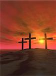 Three crosses on a hill on a background of a sunset