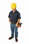 Depressed, downcast construction worker wondering about his employment prospects.  Isolated.