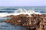 waves rolling over rocks on an irish beach