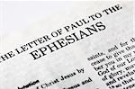 A macro detail of the book of Ephesians in the Christian New Testament