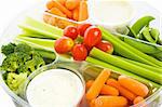 Closeup view of a party tray of delicious raw vegetables and dip.