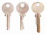 Three average office or house keys, isolated on a blank white background.