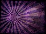 Radiating grunge background in purple and with a weathered effect