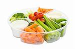 Isolated tray of raw vegetables and dip with clipping path.