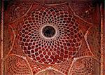 India, Agra: Taj Mahal; detail of a decorative wall with red carved stone at the mosque