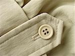 unbleached linen clothes fragment with button