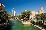 Beautiful shopping mall Souk Madinat Jumeirah and famous hotel Burj Al Arab in Dubai, UAE