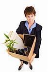 Woman laid off from work, carrying her belongings in a box.  Full body isolated on white.