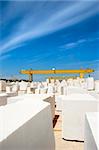 Marble blocks aligned in factory yard, Alentejo, Portugal