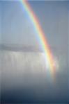 A rainbow shot against the fog of Niagara Falls.