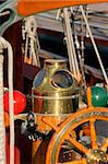 wooden steering wheel from antique sailing yacht detail