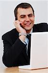 Successful businessman having phone conversation