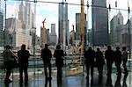 People looking at Ground Zero in Lower Manhattan.