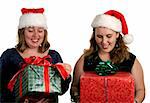 Two women opening their Christmas gifts.