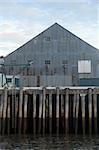 These are old buildings that were once used as canneries and similar fishing industry type businesses. Taken on the Naknek River in Bristol Bay, Alaska.