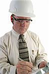 a closeup of an engineer, wearing safety goggles, and writing on a clipboard. Isolated