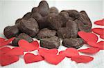 Multiple Chocolate love hearts with red paper hearts