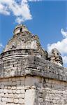 Mayan heritage in Chichen Itza, - the wall of Observatory El Caracol (Fragment) on the blue sky, Yucatan, Mexico.