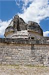 Mayan heritage in Chichen Itza, - the wall of Observatory El Caracol (Fragment) on the blue sky, Yucatan, Mexico