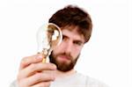 A concept image displaying a very out of focus man and light bulb, conveying a fuzzy, or unclear idea.