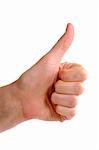 An adult female hand holding their thumb in the air. Seen from the side with clipping path;