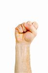 A male fist in the air isolated on white with clipping path.