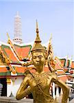 Guardian statue at  the Buddhist temple of Wat Phra Kaeo at the Grand Palace in Bangkok, Thailand.