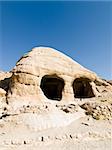 Tombs in Petra - Nabataeans capital city (Al Khazneh) , Jordan. Made by digging a holes in the rocks. Roman Empire period.