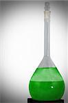 chemical flask wih green liquid
