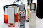 Fragrances Bottles and Mens Accessories in a white background