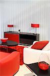 Modern living room with red and black furniture