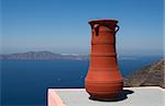 Claypot with view over the Aegean Sea, Santorini, Greece