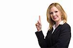 Attractive blonde woman in professional business suit standing sideways on white holding up one finger